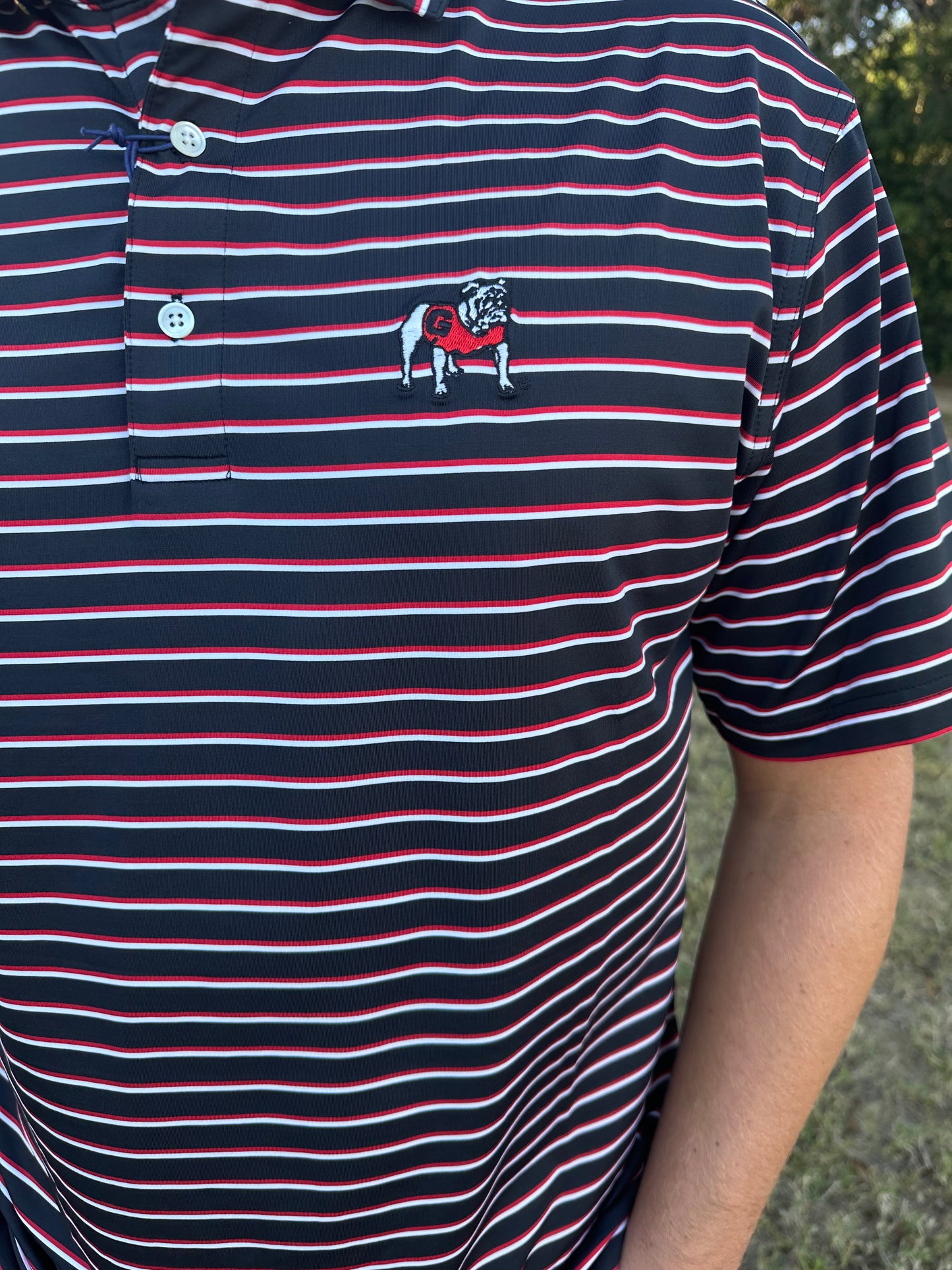 Onward Reserve UGA Fairway Stripe Standing Bulldog Performance Polo - Black